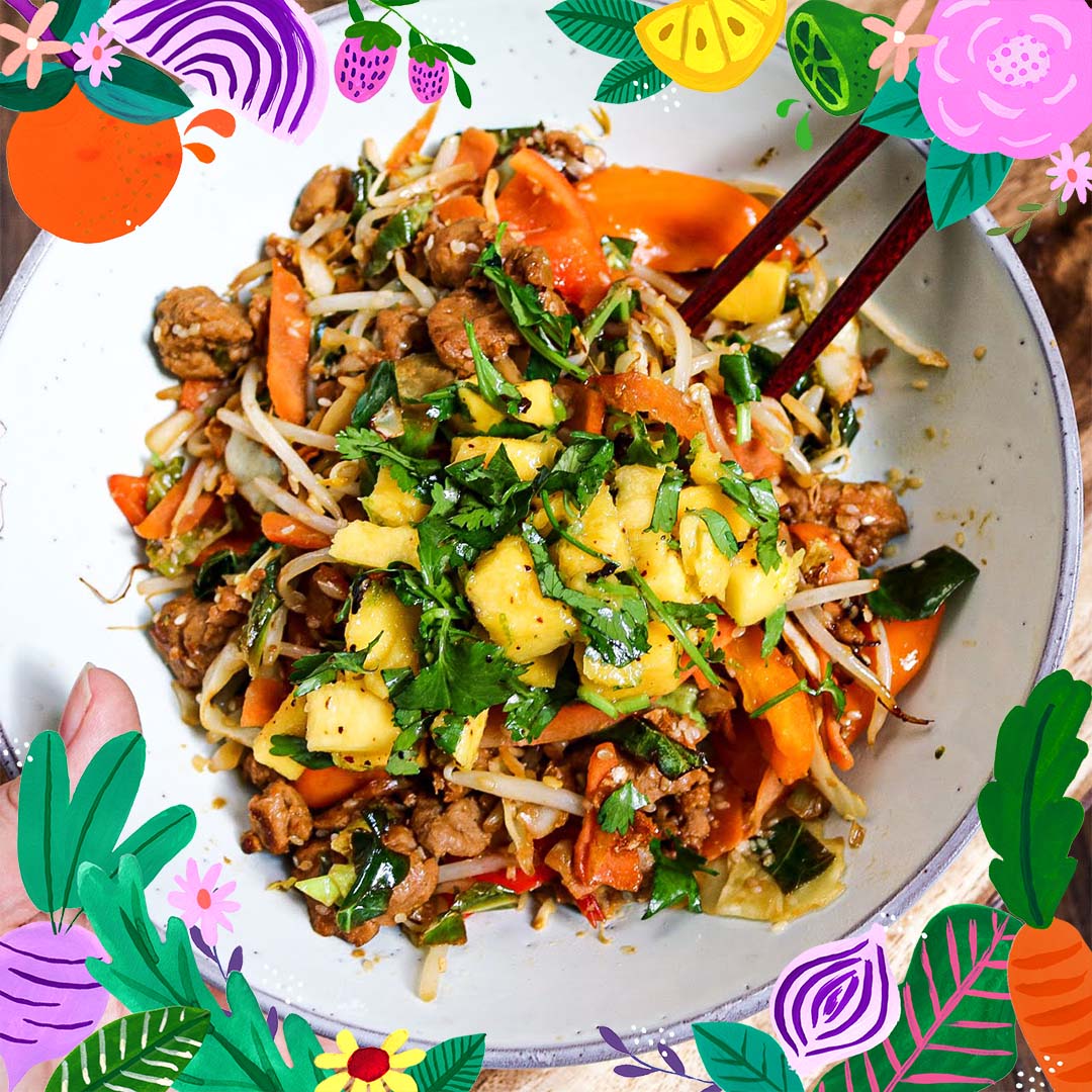 bowl of stir fry with chopsticks