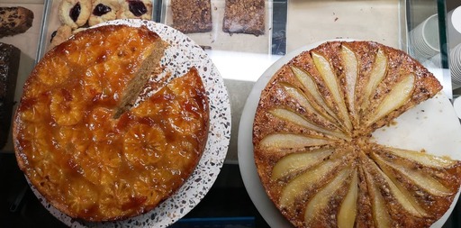 vegan clementine cake alongside vegan pear and walnut cake